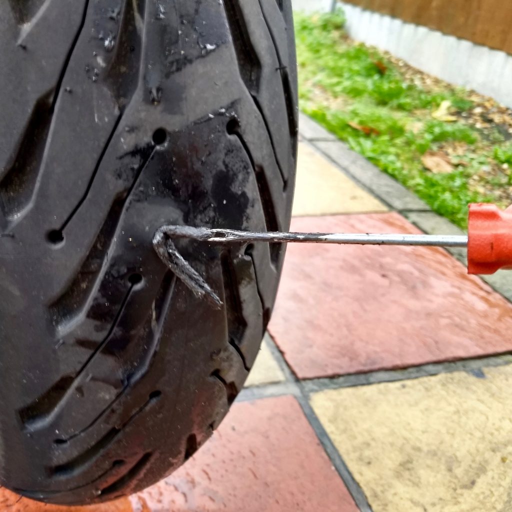 Fixing motorcycle puncture